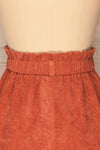 Loxley Clay Orange Corduroy Mini Skirt | La Petite Garçonne back close-up