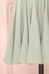 Lyana Light Green Faux-Wrap Short Dress | Boutique 1861 bottom