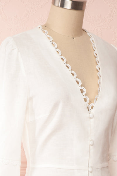 Lysistrata White Short Dress w/ 3/4 Sleeves | Boutique 1861 side close up