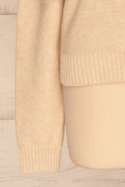 Magalie Beige Knit Sweater | Tricot | La Petite Garçonne bottom close-up