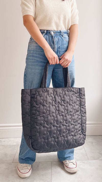 Maisie Black Floral Quilted Bag | La petite garçonne on model