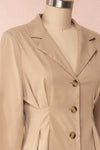 Maribelle Beige Long Sleeved Trench Coat | Boutique 1861 side close up