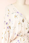 Mercy Beige 3/4 Sleeve V-Neck Floral Romper | Boutique 1861 side close-up