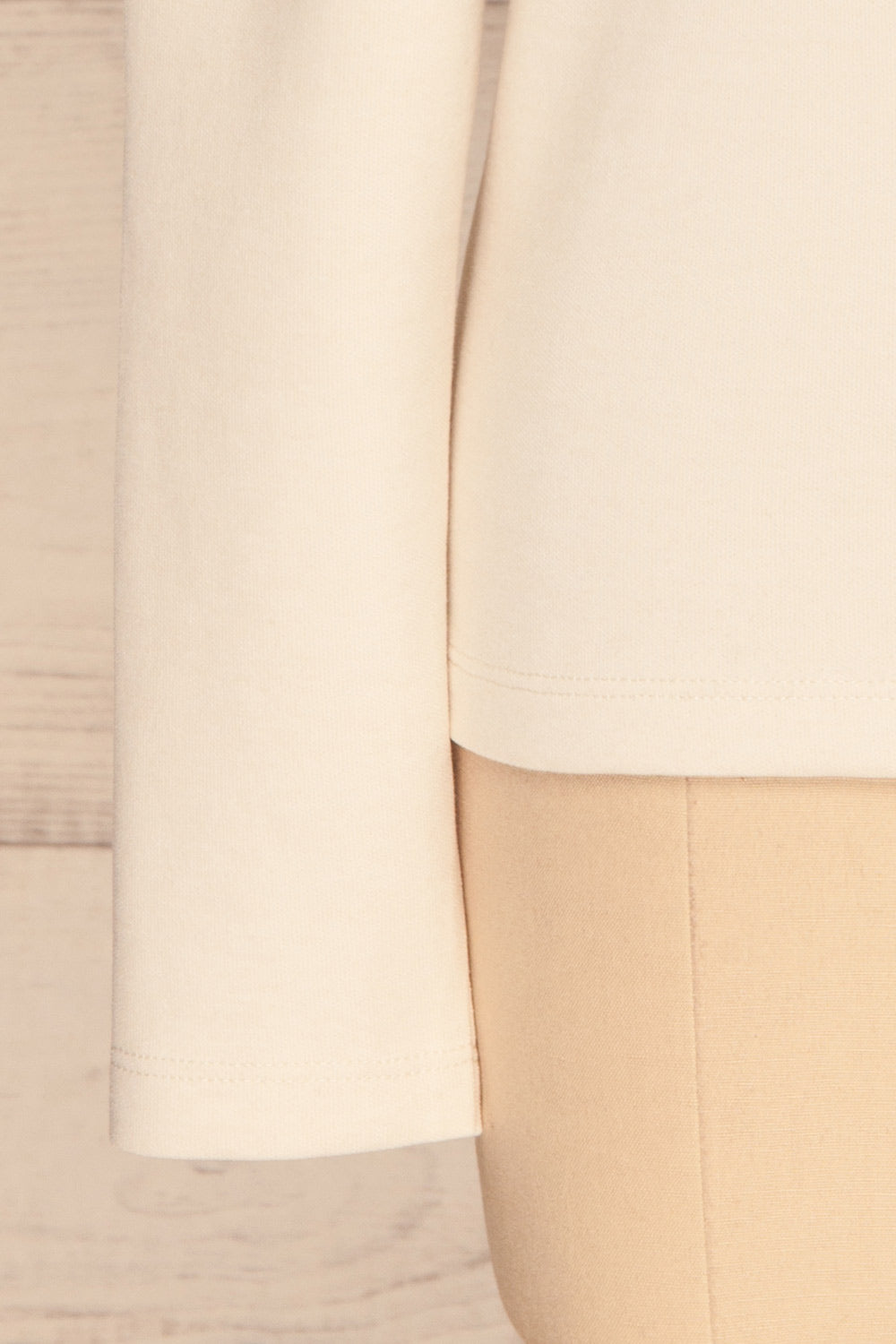 Methon Chalk White Mock Neck Top | Haut | La Petite Garçonne bottom close-up