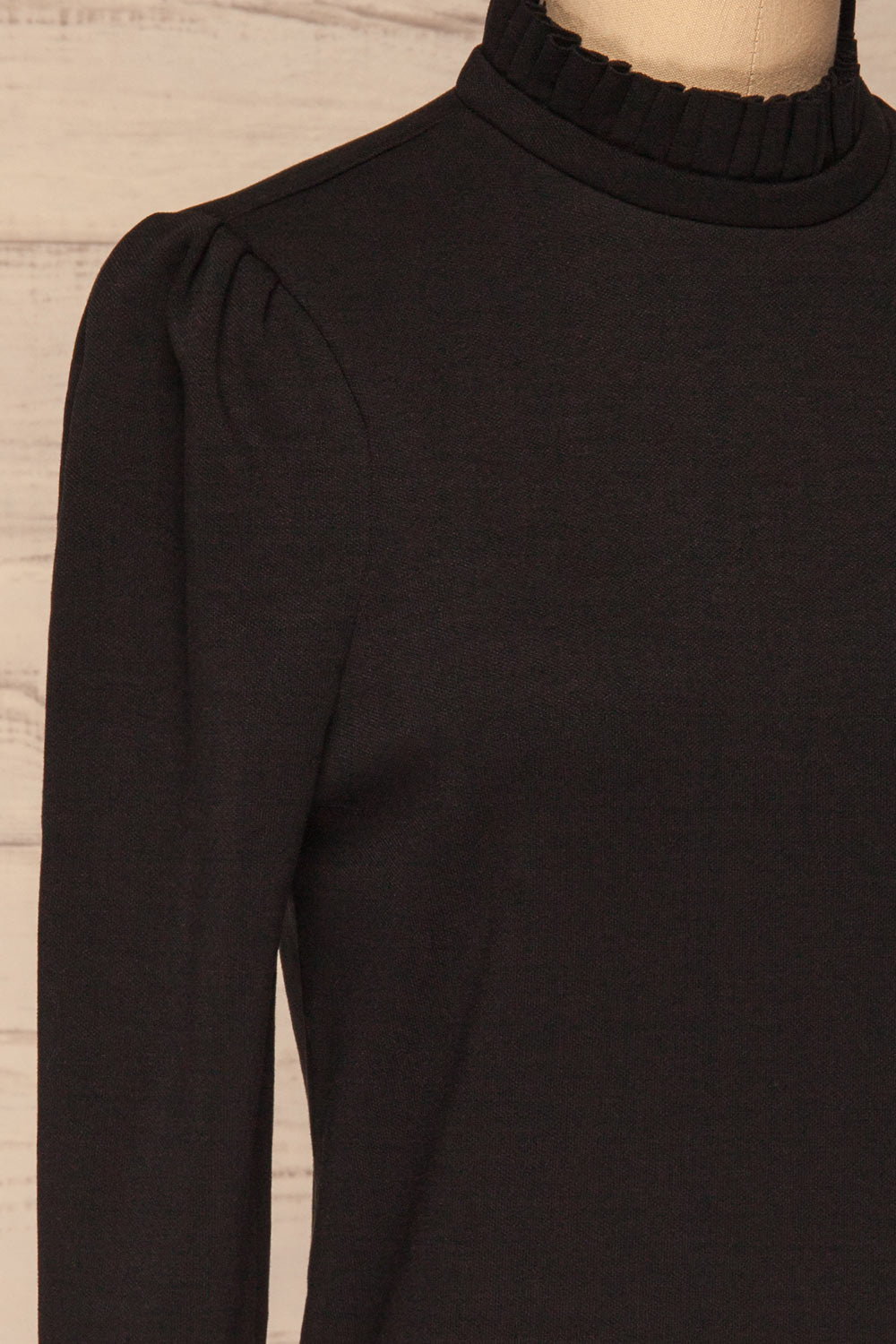 Methon Coal Black Mock Neck Top | Haut | La Petite Garçonne side close-up