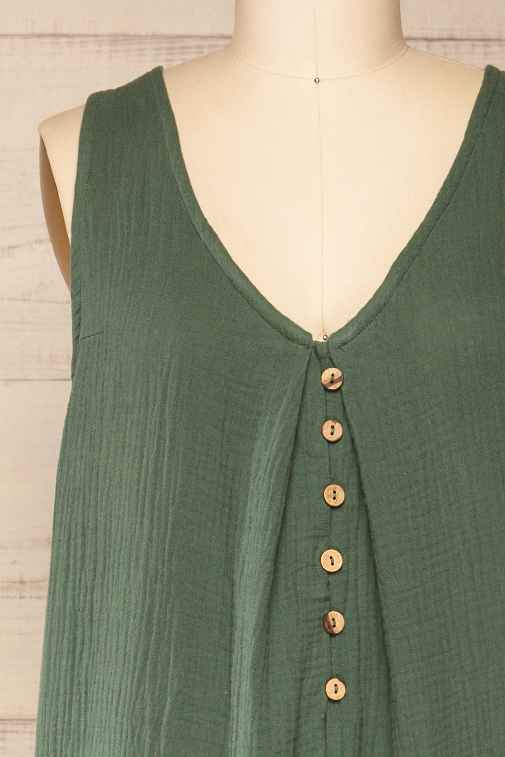Miass Green Sleeveless Button-Up Jumpsuit  | La petite garçonne front close-up