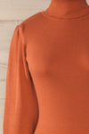 Moino Clay Orange Puffy Sleeve Turtleneck | La petite garçonne front close-up