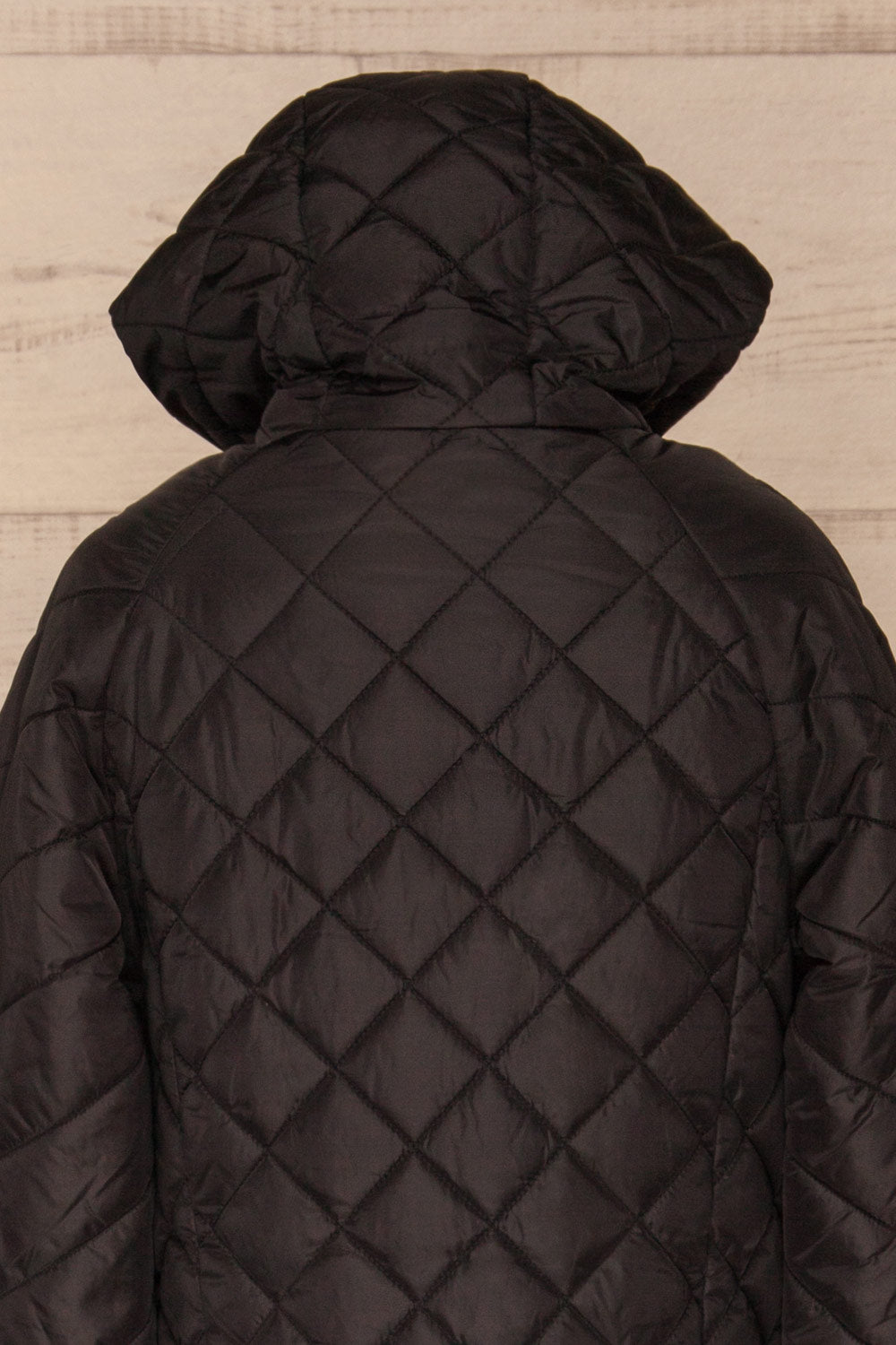 Natasiya Black Hooded Long Quilted Coat | La Petite Garçonne back close-up hood 