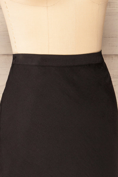 Nikaia Black Silky High-Waisted Midi Skirt | La petite garçonneside close up