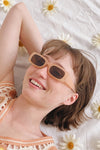 Okh Peach Rectangular Frame Sunglasses | La petite garçonne on model
