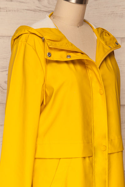 Oldham Yellow Matte Raincoat | La Petite Garçonne side close up