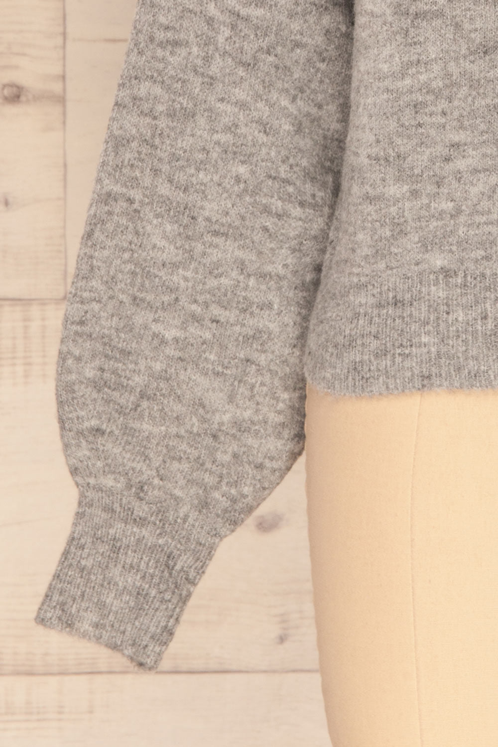 Oleksandra Grey Knit Sweater with Lace-Up Back | La Petite Garçonne bottom close-up