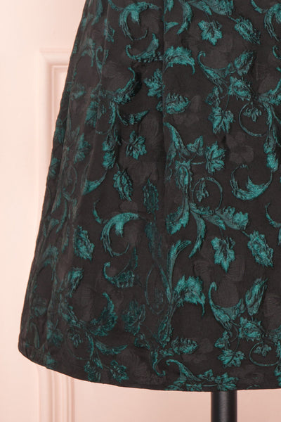 Orynko Black Cocktail Dress with Green Embroidery | Boutique 1861 bottom close-up