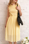 Ostra Sun Yellow Pleated Midi Dress | Boutique 1861 on model