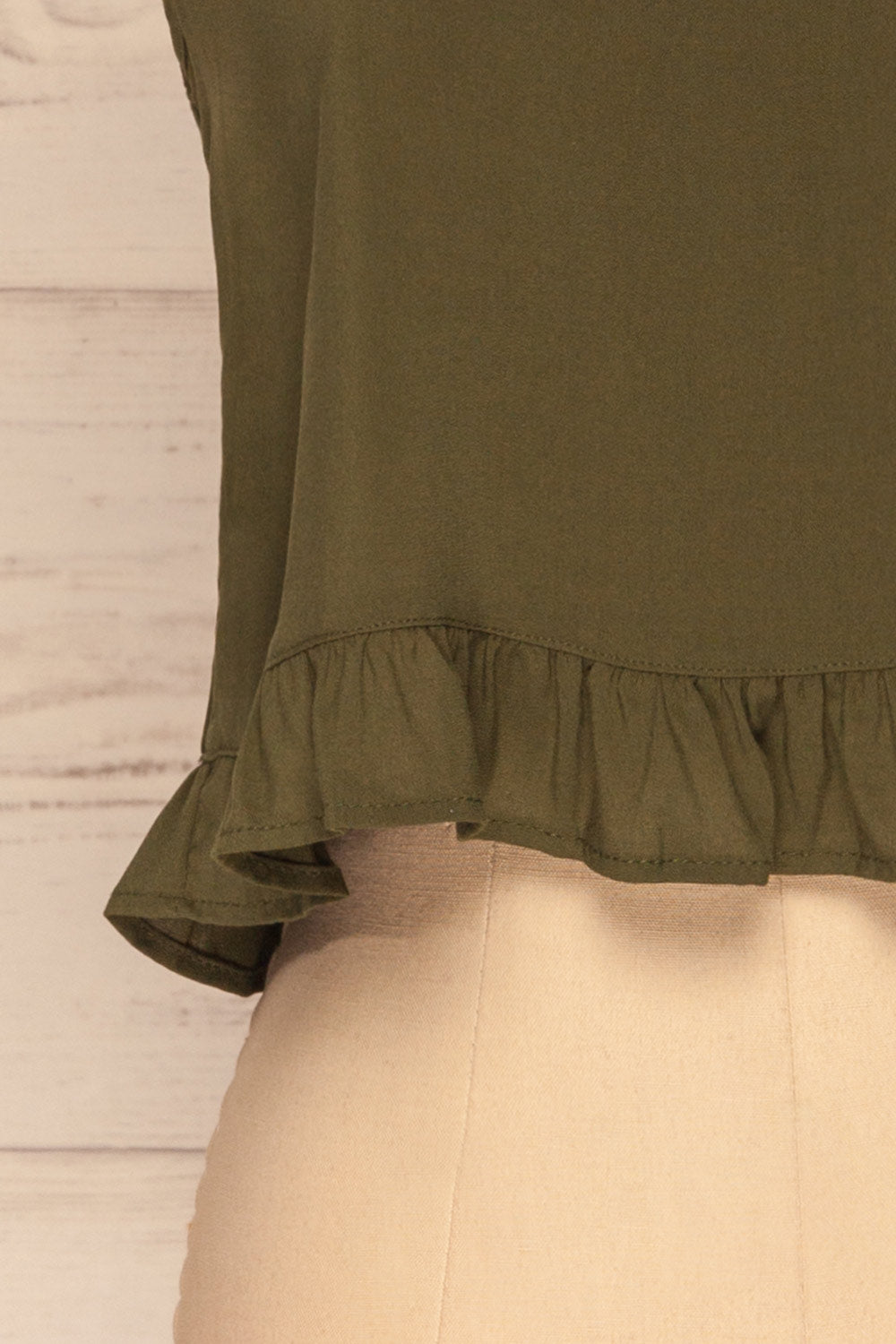 Pabianice Green Cropped Cami w/ Frills | La petite garçonne bottom close-up