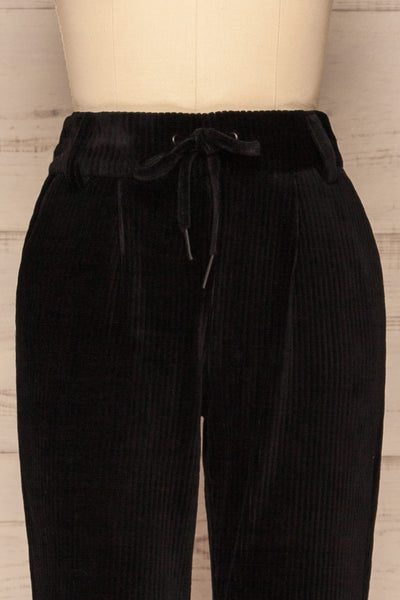 Pasio Licorice Black Corduroy Pants | La Petite Garçonne front close-up