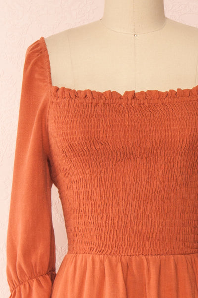 Reatha Rust Orange Linen Half Sleeve Dress | Boutique 1861 front close-up