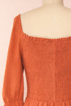 Reatha Rust Orange Linen Half Sleeve Dress | Boutique 1861 back close-up