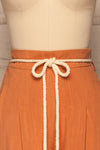 Rotello Orange High-Waisted Cropped Pants | La petite garçonne front close-up