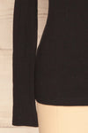 Roust Black Cotton Ribbed Turtleneck Top sleeve close up | La Petite Garçonne