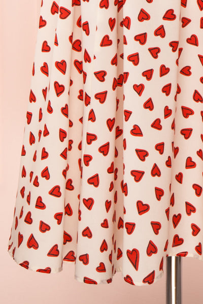 Simonette Ivory Red Heart Pattern Midi Dress | Boutique 1861 bottom close-up