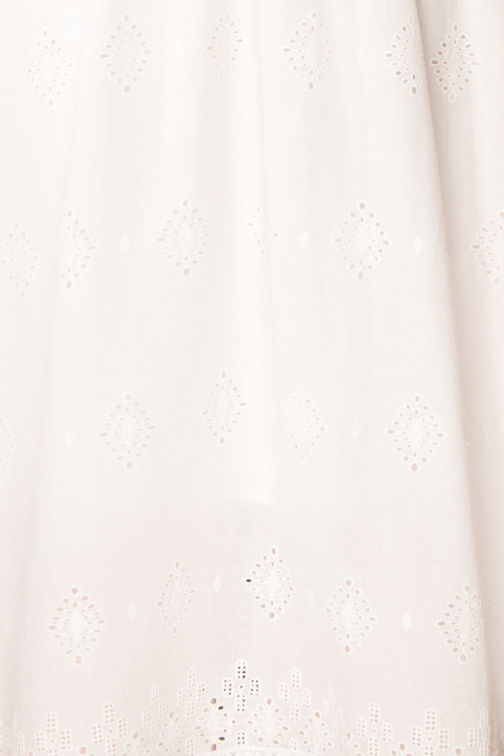 Sioban White High-Waisted Openwork Midi Skirt | Boutique 1861 fabric