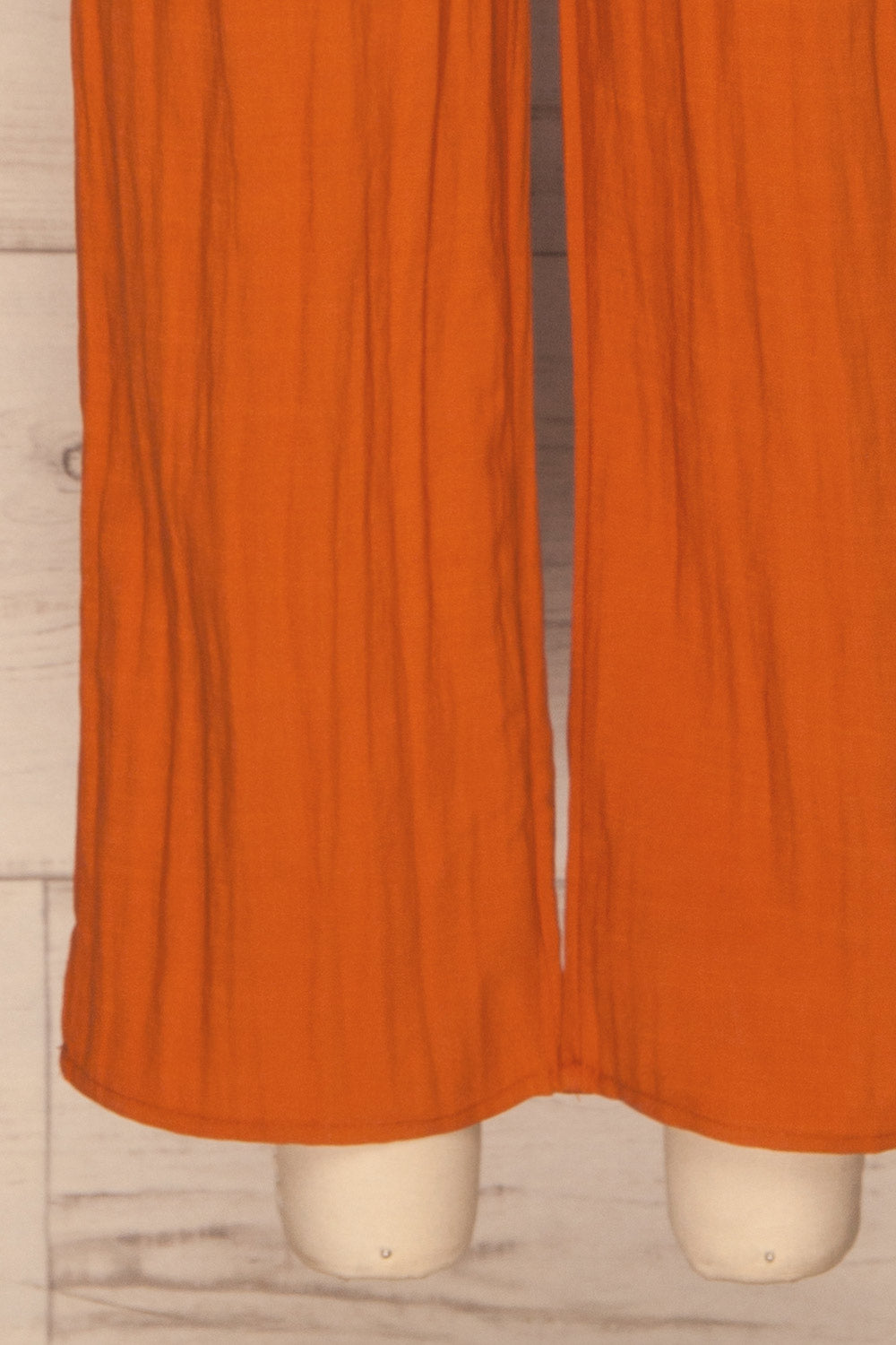Tarja Rust Orange Short Sleeve Jumpsuit | La petite garçonne bottom close-up