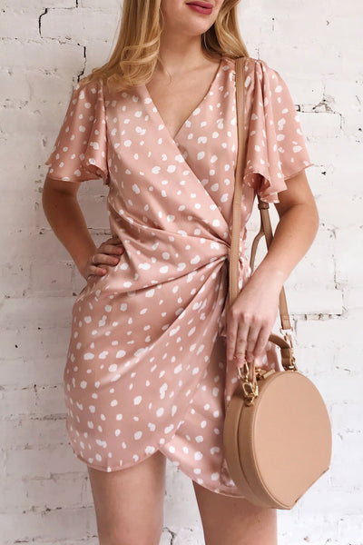 Tryphena Pink Short Sleeved Wrap Dress | La petite garçonne model close up