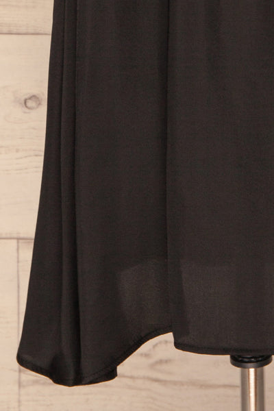 Udine Onyx Black Midi Dress | Robe Noire skirt close up | La Petite Garçonne