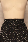 Yveline Black Pleated Midi Skirt | La petite garçonne  front close up