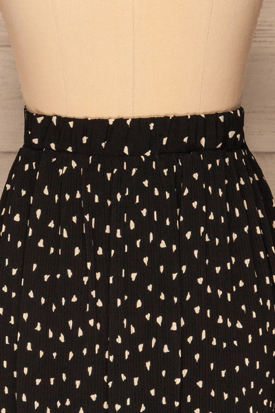 Yveline Black Pleated Midi Skirt | La petite garçonne  back close up