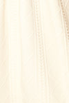 Adema Cream Puffy Sleeve Knitted Dress | La petite garçonne fabric