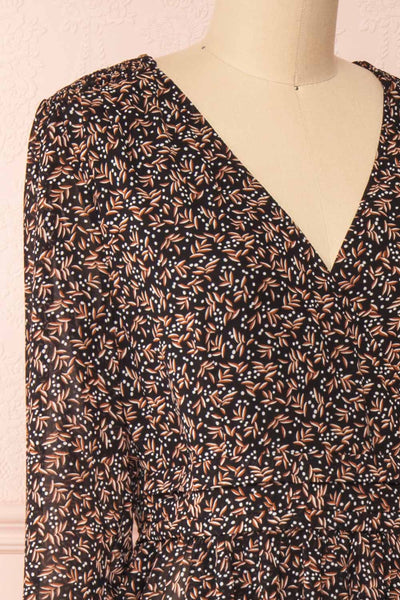 Agape Black Floral Long Sleeve Wrap Dress | Boutique 1861 side close-up