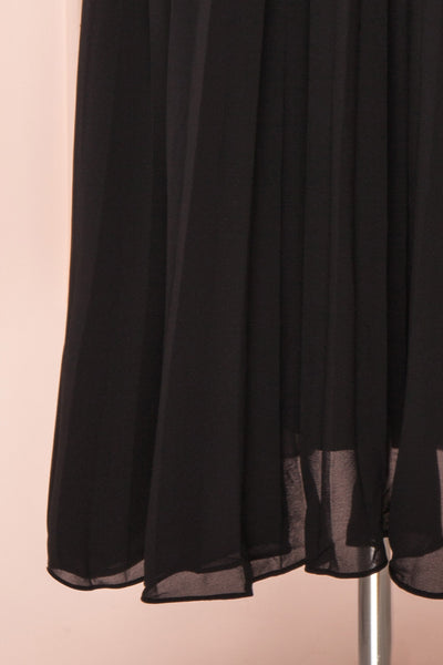 Alisha Onyx Black Pleated A-Line Midi Dress | Boutique 1861 bottom close-up