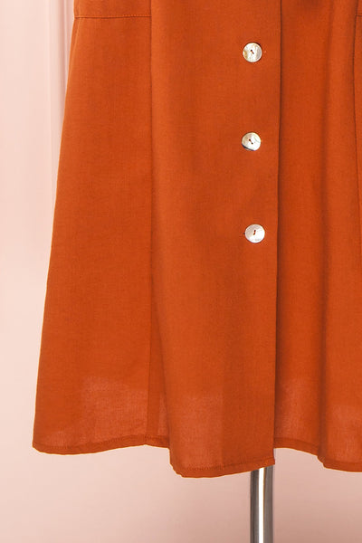 Anichka Orange Midi Dress w/ Buttons | Boutique 1861 bottom close-up