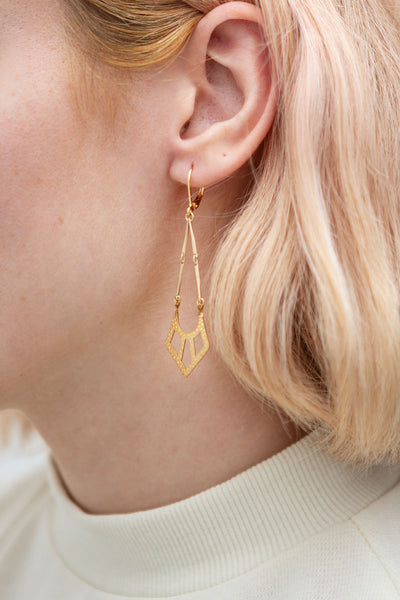 Ann Sothern Golden Geometric Pendant Earrings | La Petite Garçonne model