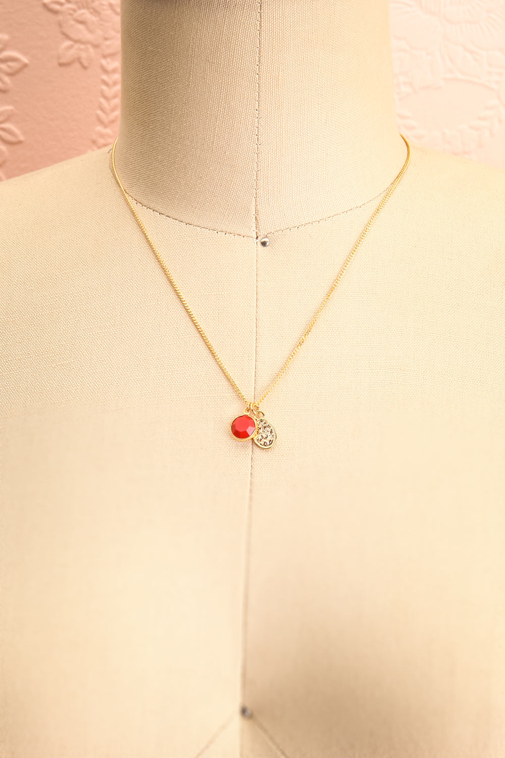 Anna Netrebko Red & Golden Pendant Necklace on mannequin | Boutique 1861
