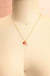 Anna Netrebko Red & Golden Pendant Necklace on mannequin | Boutique 1861
