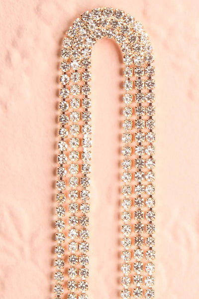 Apalota Gold Long Crystal Pendant Earrings | Boutique 1861 close-up