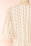 Assoura Cream Puffy Sleeve Floral Maxi Dress | Boutique 1861 back close-up