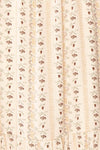 Assoura Cream Puffy Sleeve Floral Maxi Dress | Boutique 1861 fabric