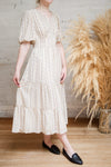 Assoura Cream Puffy Sleeve Floral Maxi Dress | Boutique 1861 model