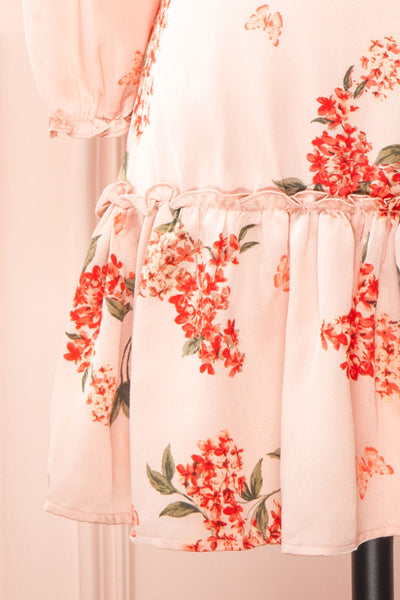 Astralle Long Sleeve Short Floral Satin Wrap Dress | Boutique 1861 bottom close-up