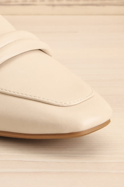 Auris Ivory Faux Leather Loafers | La petite garçonne front close-up
