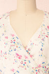 Aymara Off-White Floral Short Sleeve Wrap Dress | Boutique 1861 front close-up