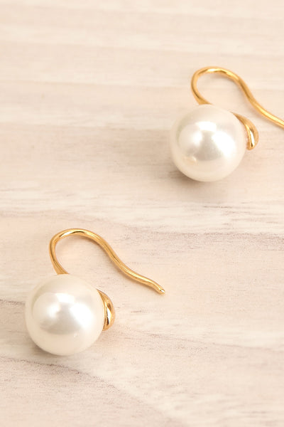 Azerro Gold Pearl Pendant Earrings close-up | La Petite Garçonne