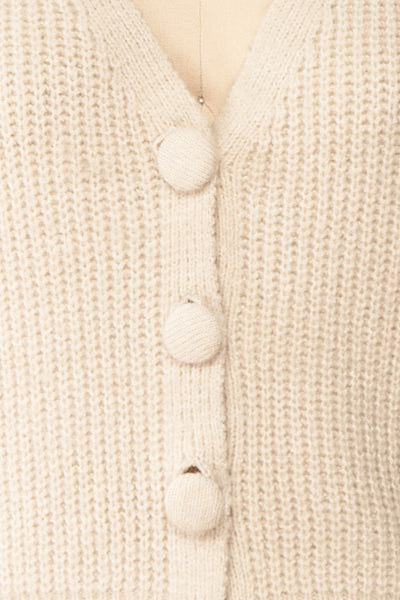 Benita Cream V-Neck Cropped Knit Cardigan | Boutique 1861 fabric