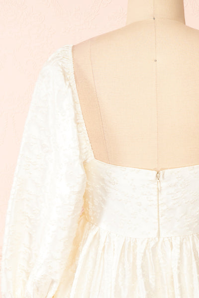 Betie Ivory Satin Embroidered Babydoll Dress | Boutique 1861 back close-up