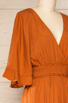 Botosani Orange Short Sleeve V-Neck Jumpsuit | La petite garçonne  side close-up