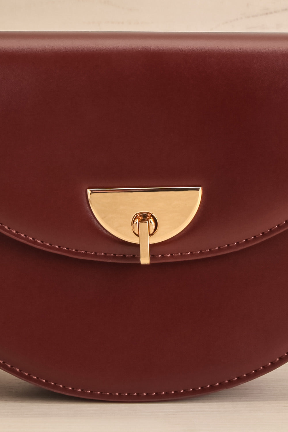 Braite Burgundy Half-Moon Crossbody Bag | La petite garçonne front close-up